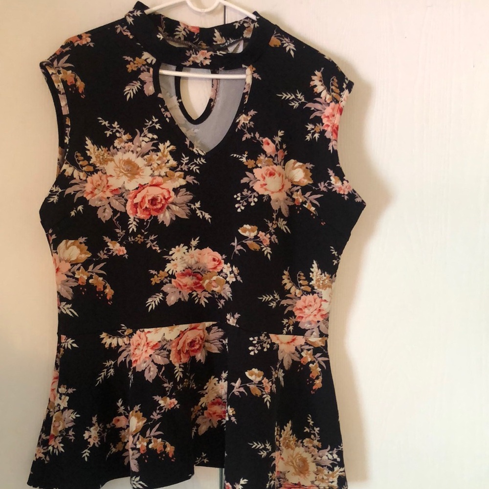 Woman’s floral spring Sleeveless Peplum Blouse with Cut Out